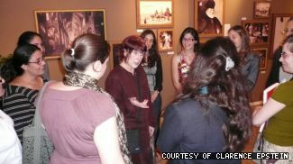 Catherine MacKenzie (centre) is surrounded by interested students at Hebrew University’s exhibition of <em>Auktion 392:  Reclaiming the Galerie Stern, Düsseldorf</em>.